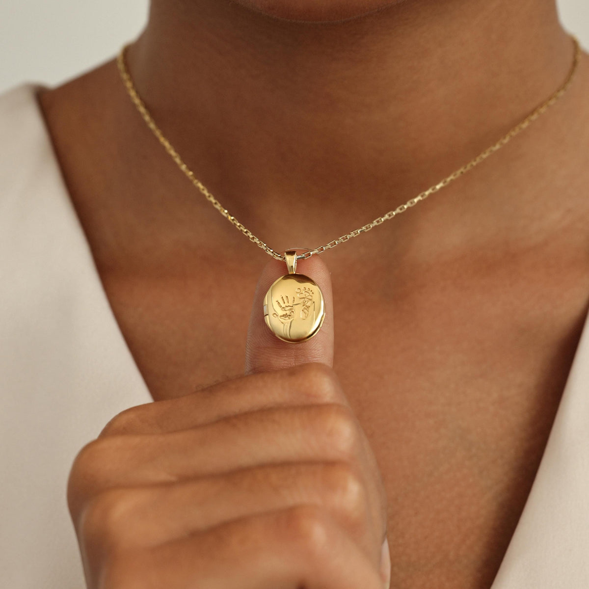 Baby Footprint & Handprint Oval Locket Necklace — photo 1