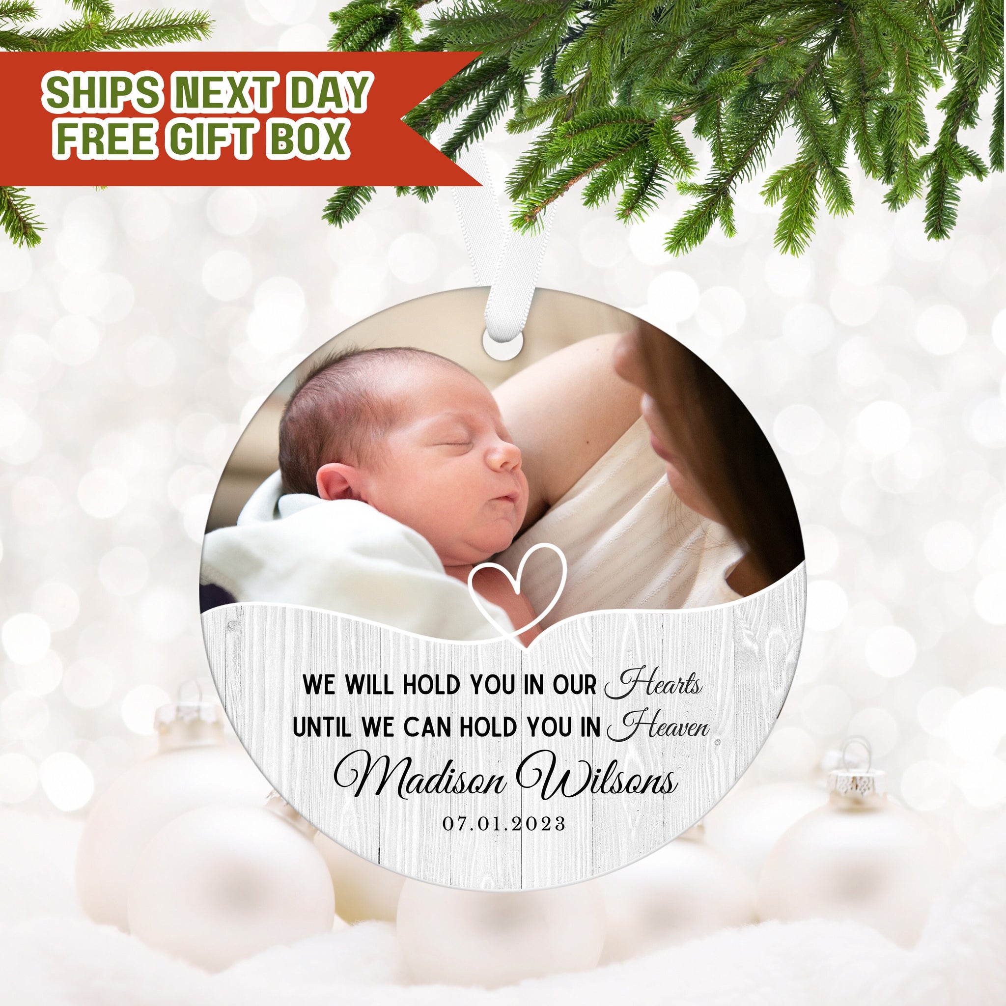 a christmas ornament with a picture of a baby